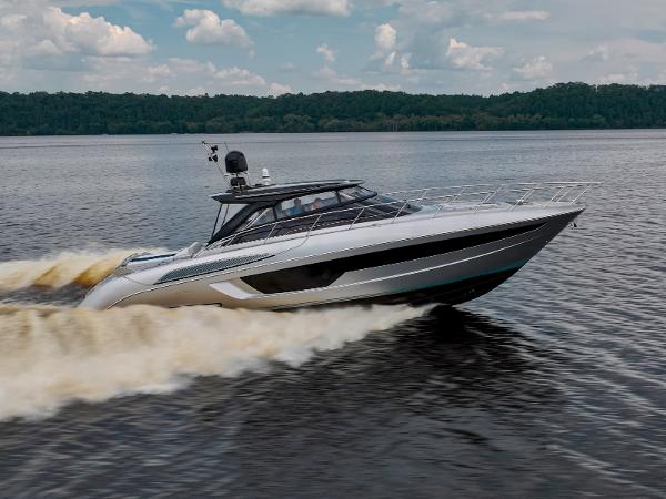 Riva 56' Rivale 2023 Riva 56 RIVALE luxury yacht cruising on a lake.