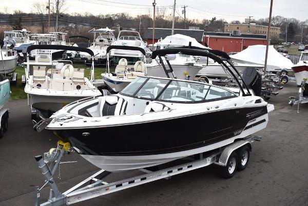 Monterey 275SS 2024 Monterey 275SS black boat on trailer at marina.