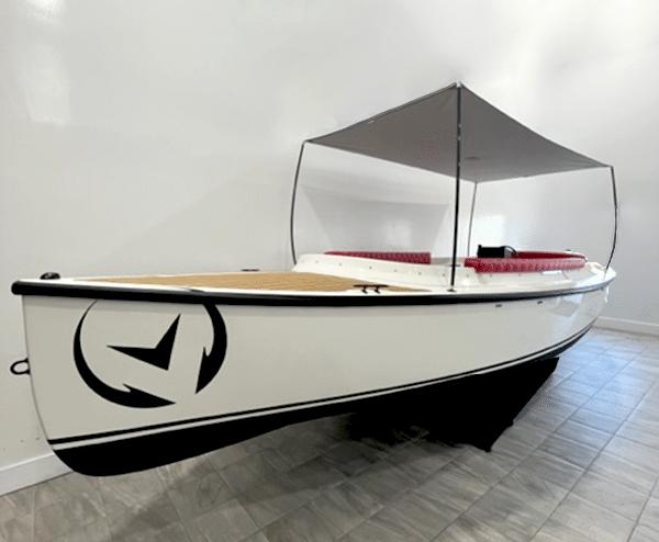 Vision Marine Technologies Fantail 217 2024 Vision Marine Technologies Fantail 217 boat with canopy, displayed indoors.