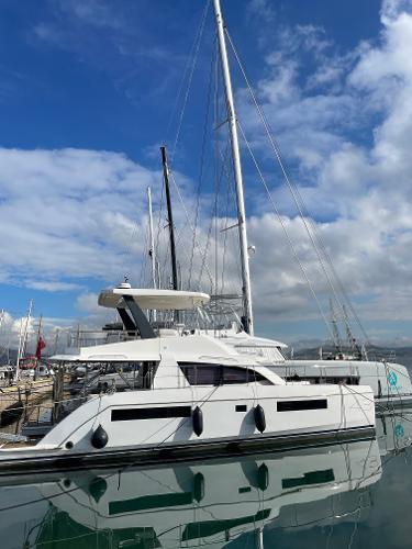 Leopard 43 Powercat 2020 Leopard 43 Powercat yacht docked at marina under blue sky.