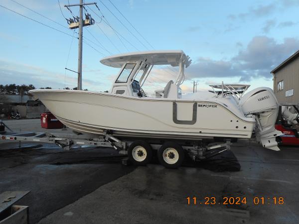 Sea Fox 288 Commander 2025 Sea Fox 288 Commander boat on trailer, side view.