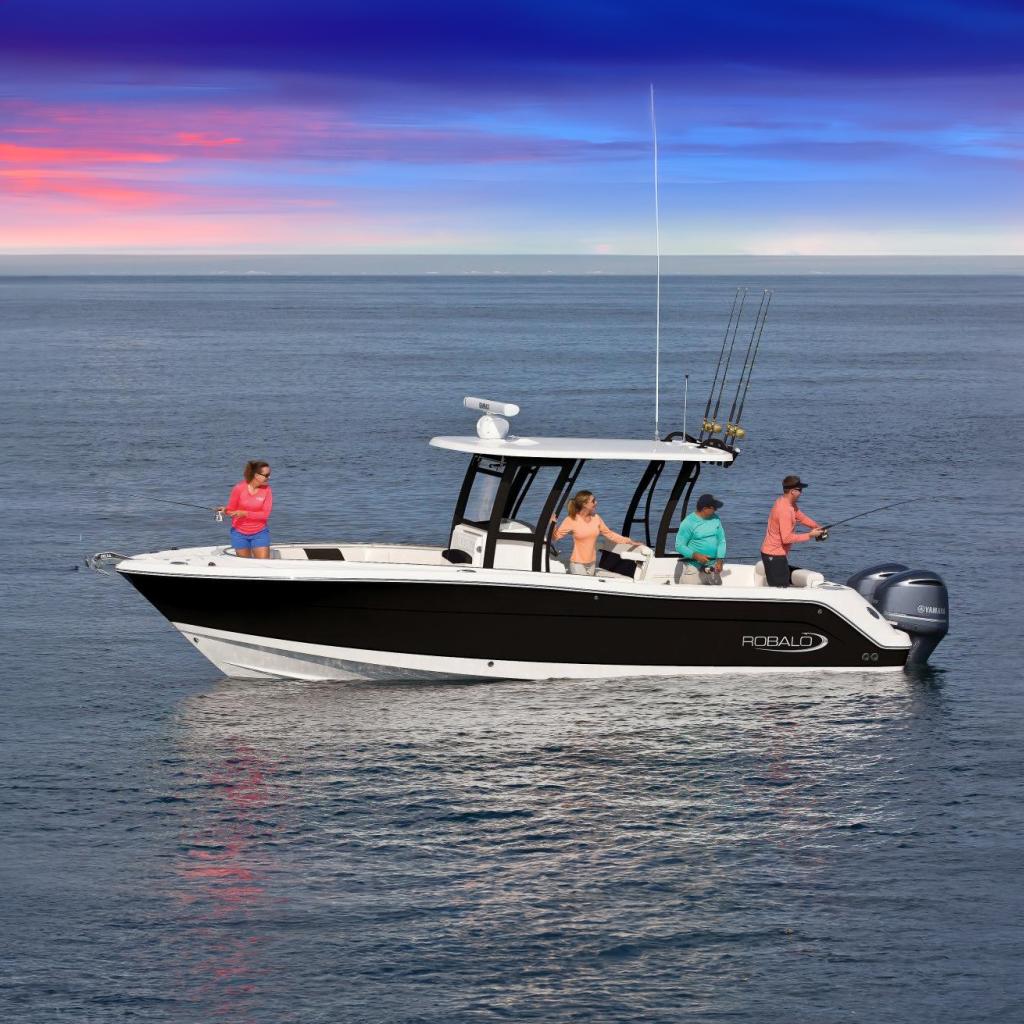 Robalo R302 Center Console Manufacturer Provided Image: 2017 Robalo R302 Center Console boat with people fishing on calm water.