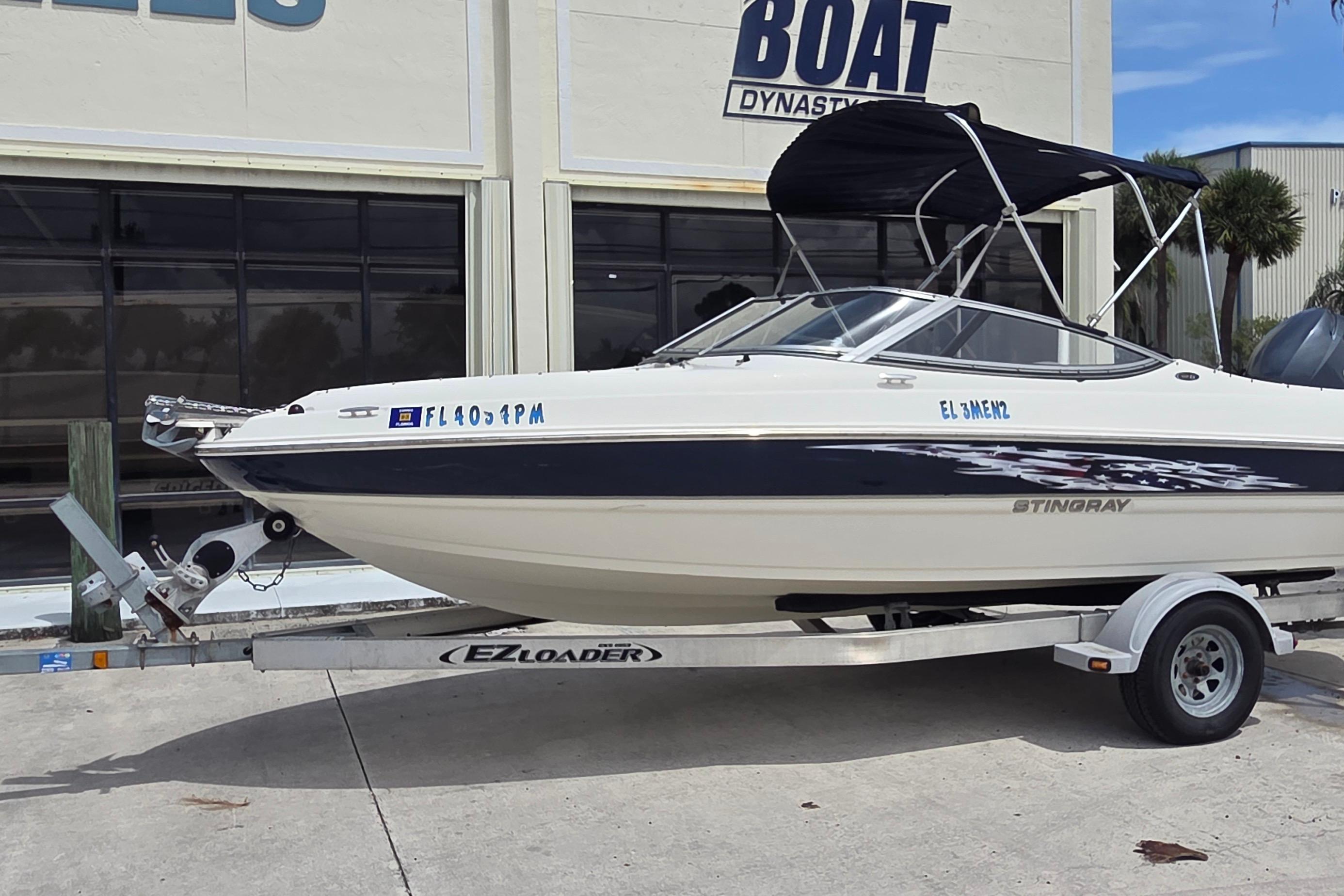 Stingray 194 LX 2013 Stingray 194 LX boat on trailer outside dealership.