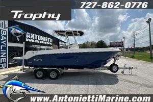 Trophy T24 CC 2025 Trophy T24 CC boat on trailer at Antonietti Marine dealership.