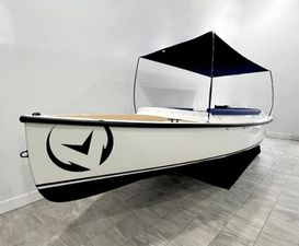 Vision Marine Technologies Fantail 217 2023 Vision Marine Technologies Fantail 217 boat with canopy, displayed indoors.
