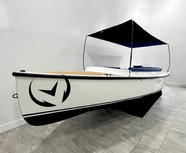 Vision Marine Technologies Fantail 217 2023 Vision Marine Technologies Fantail 217 boat with canopy, displayed indoors.