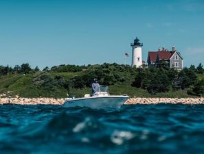Edgewater 170CC Edgewater 170CC boat on ocean near lighthouse, 2025 model.