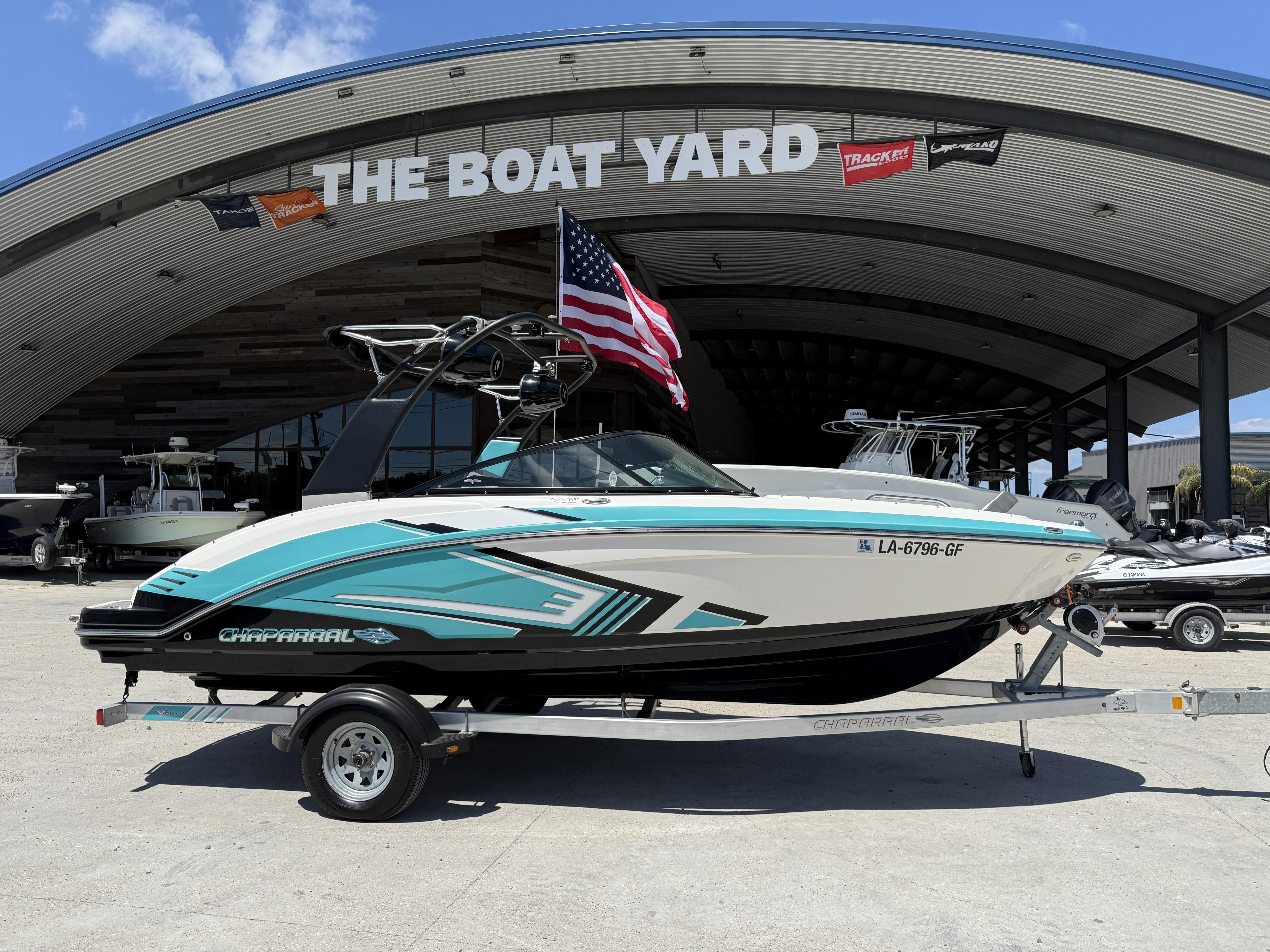 Chaparral VRX 203 2016 Chaparral VRX 203 boat on trailer at The Boat Yard, American flag displayed.