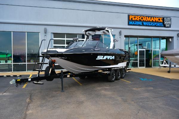 Supra SE450 2025 Supra SE450 boat on trailer at Performance Marine Watersports dealership.