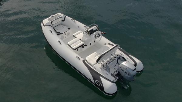 Walker Bay Generation 13 LTE 2024 Walker Bay Generation 13 LTE inflatable boat on water.