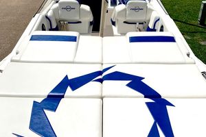 Fountain 42 Executioner 2005 Fountain 42 Executioner boat interior with white and blue seating design.