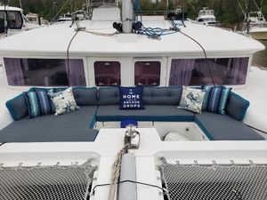 Lagoon 450 Catamaran Lagoon 450, 2011 model, with cozy outdoor seating and decorative pillows.