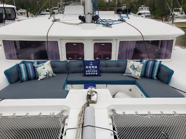 Lagoon 450 Catamaran Lagoon 450, 2011 model, with cozy outdoor seating and decorative pillows.