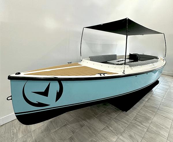 Vision Marine Technologies Fantail 217 2023 Vision Marine Technologies Fantail 217 boat with canopy, displayed indoors.