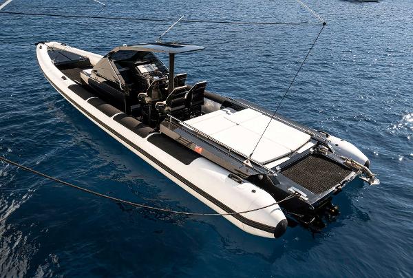 Goldfish 38 Supersport 2018 Goldfish 38 Supersport boat on clear blue water, sleek design, luxury seating.