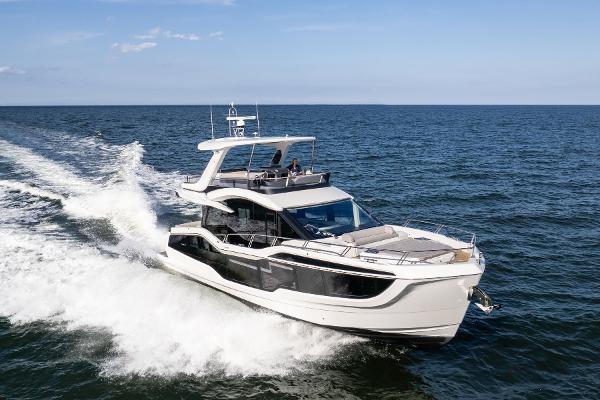 Galeon 560 Fly 2025 Galeon 560 Fly yacht cruising on open sea.