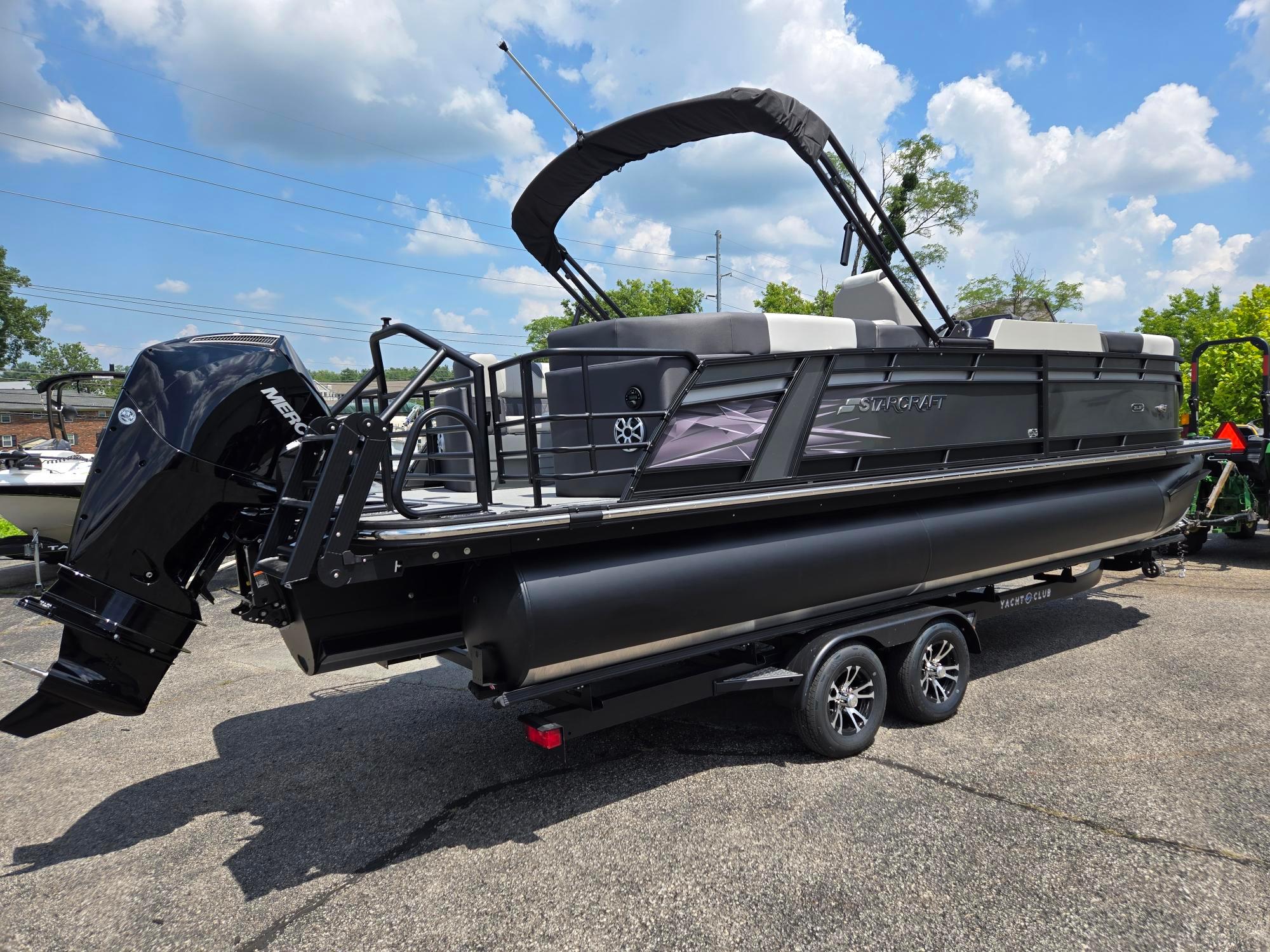 Starcraft SLS3R 2026 Starcraft SLS3R pontoon boat with Mercury outboard motor on a trailer.