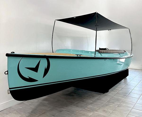 Vision Marine Technologies Fantail 217 2023 Vision Marine Technologies Fantail 217 boat with canopy, displayed indoors.