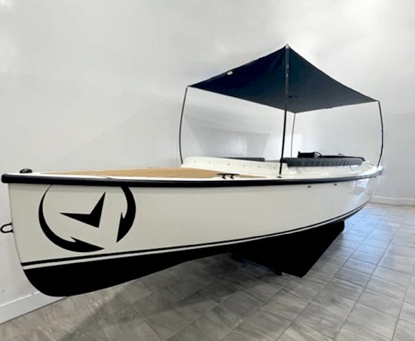 Vision Marine Technologies Fantail 217 2023 Vision Marine Technologies Fantail 217 boat with canopy, displayed indoors.
