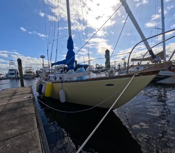 Cheoy Lee Luders 36 1972 Cheoy Lee Luders 36 sailboat docked at marina under blue sky.