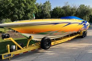 Fountain 42 Lightning 2007 Fountain 42 Lightning speedboat on a yellow trailer, vibrant custom paint job.