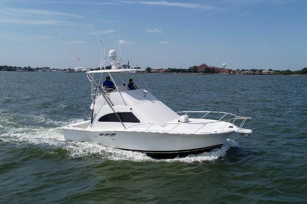 Luhrs 36 Convertible 2001 Luhrs 36 Convertible boat cruising on open water.