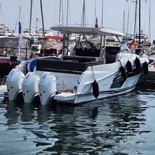 Jeanneau CAP CAMARAT 12.5 WA 2022 Jeanneau CAP CAMARAT 12.5 WA boat docked with triple outboard engines.