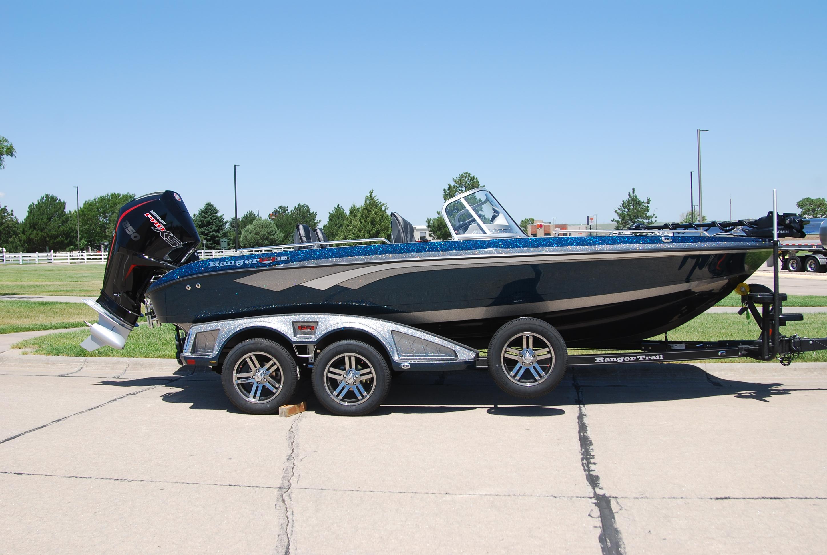 Ranger 620FS Cup Equipped 2025 Ranger 620FS Cup Equipped boat on trailer, parked outdoors on a sunny day.