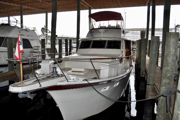 Hatteras 53 Motor Yacht 1981 Hatteras 53 Motor Yacht docked in a covered marina.