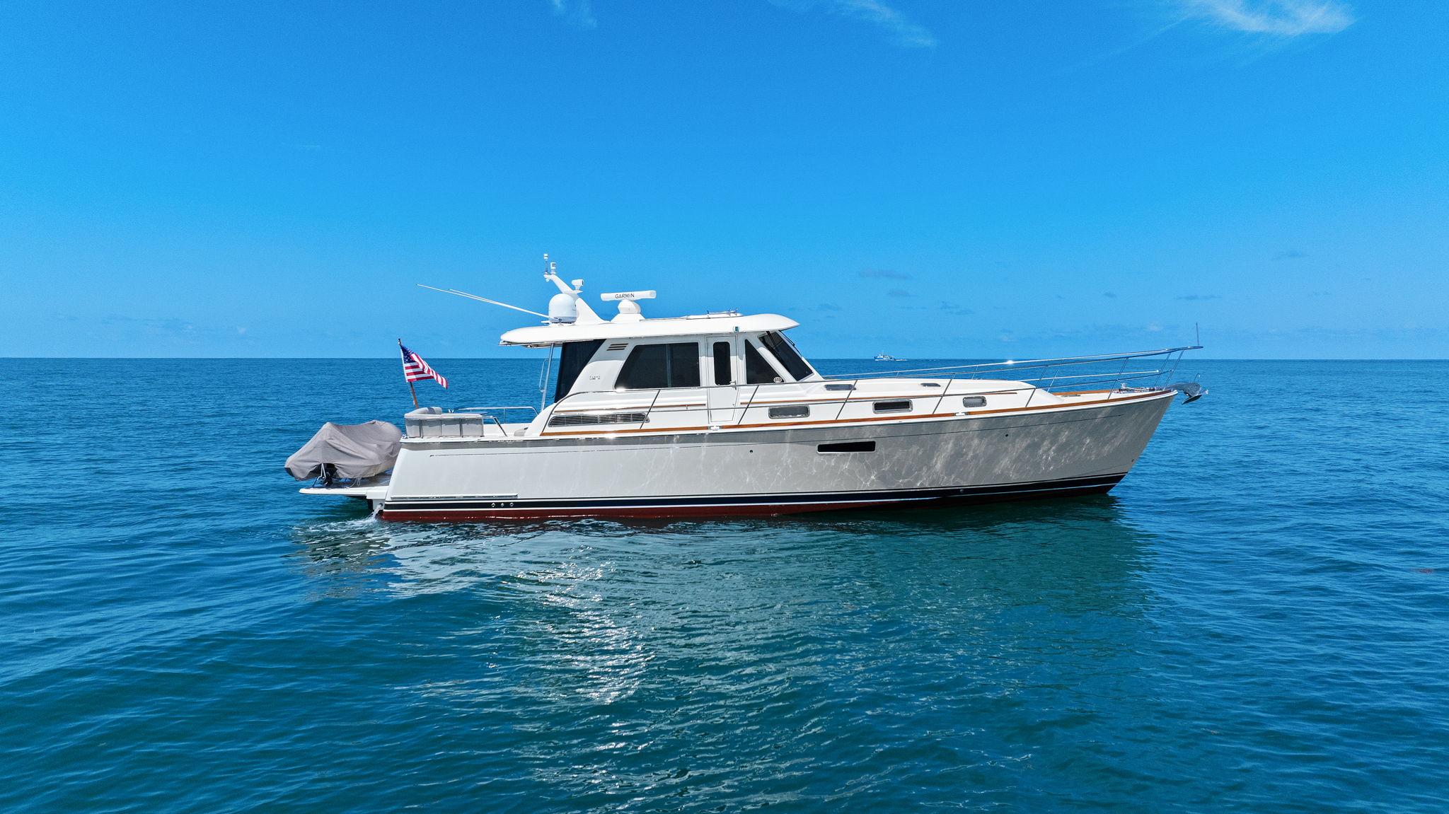Sabre 48 Salon Express 2018 Sabre 48 Salon Express yacht cruising on open blue sea.