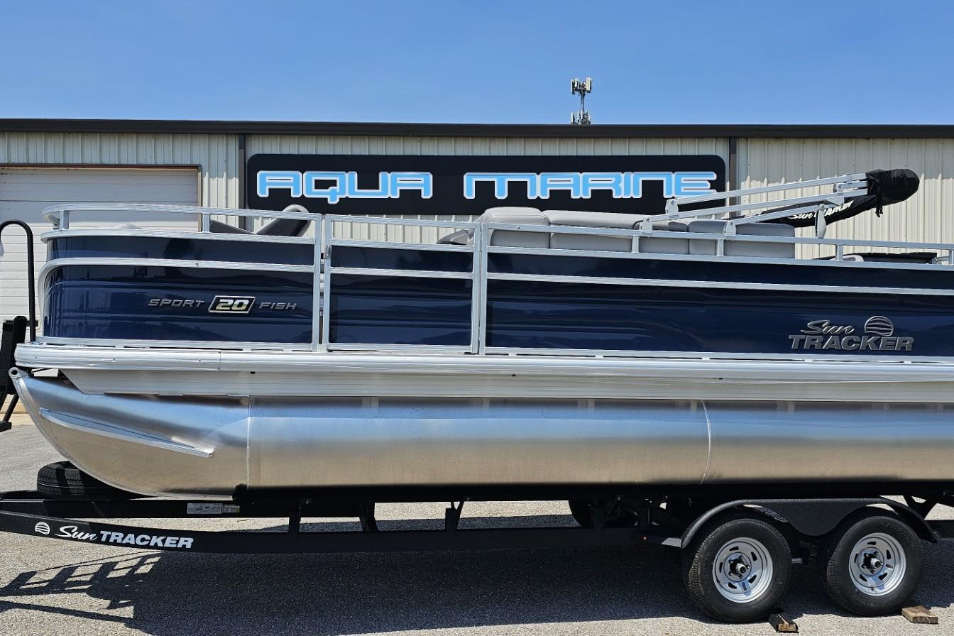 Sun Tracker SportFish 20 DLX 2026 Sun Tracker SportFish 20 DLX pontoon boat on trailer at Aqua Marine.
