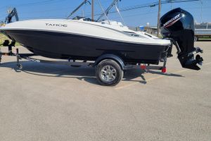 Tahoe T16 2025 Tahoe T16 boat with Mercury outboard motor on a trailer.