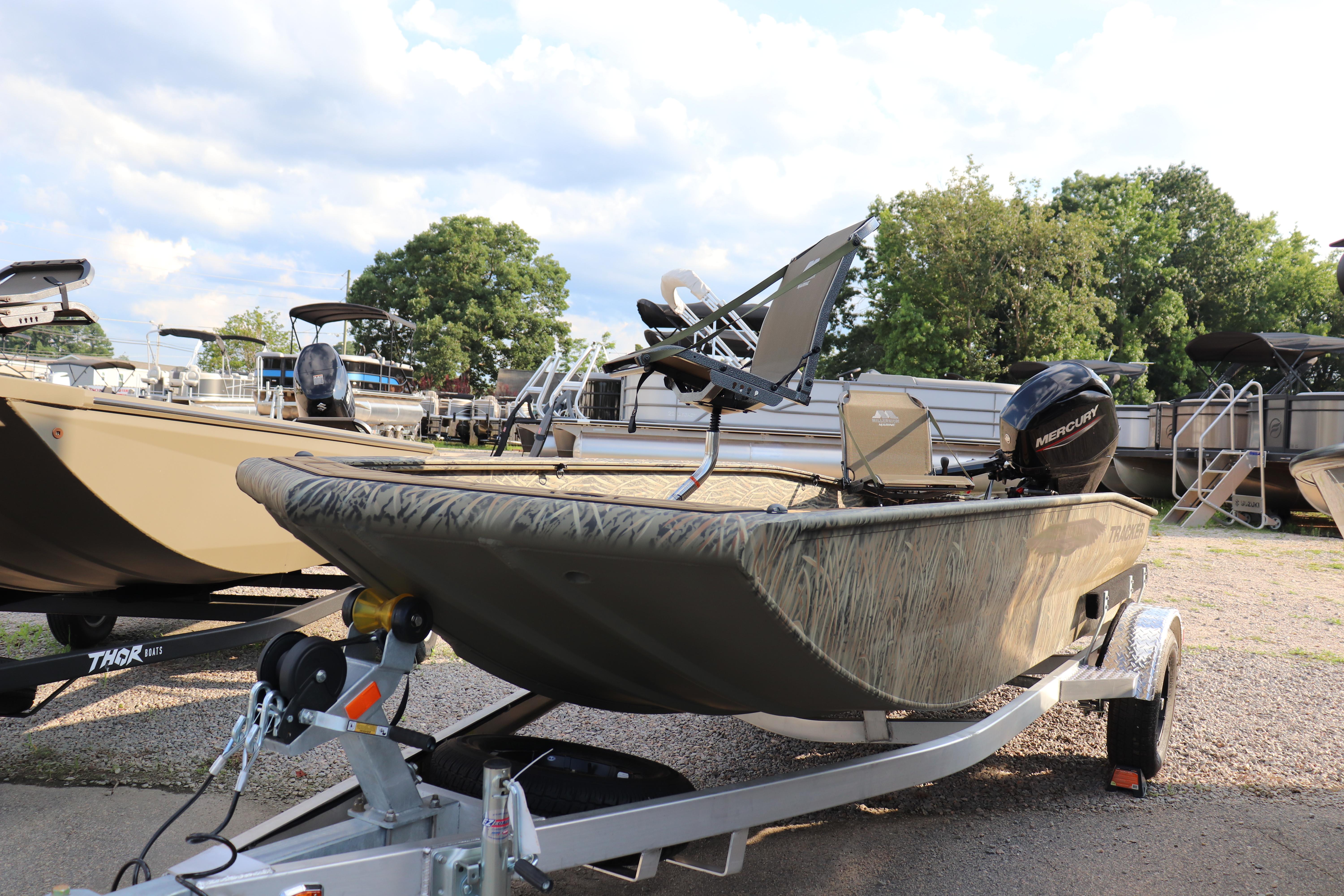 Tracker Grizzly 1650 T Prairie Wings Edition 2025 Tracker Grizzly 1650 T Prairie Wings Edition boat on trailer, outdoors.
