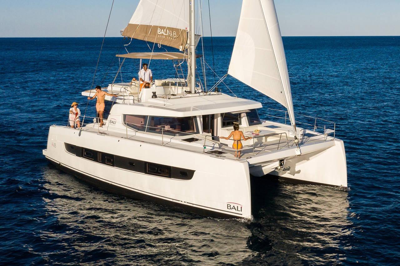 Bali Bali 4.8 2021 Bali 4.8 catamaran sailing on open sea with passengers enjoying the deck.