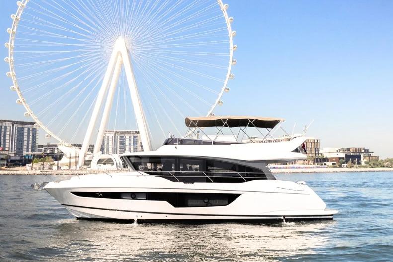Custom SKYWALKER X53 Luxurious Skywalker X53 yacht cruising near a giant Ferris wheel, 2026 model.