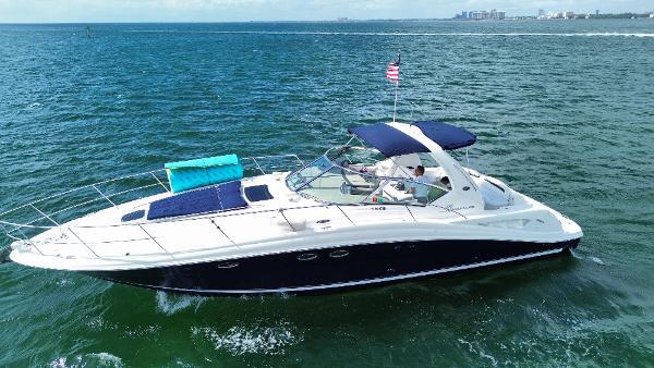 Sea Ray 420 Sundancer 2003 Sea Ray 420 Sundancer cruising on open water.