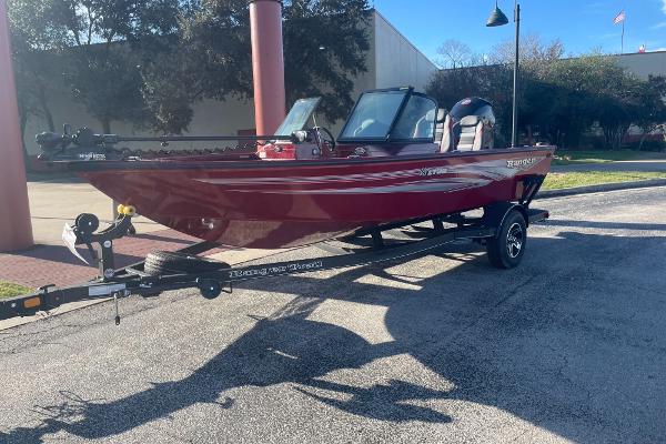 Ranger VS1782SC Angler 2024 Ranger VS1782SC Angler boat on trailer, parked outdoors.