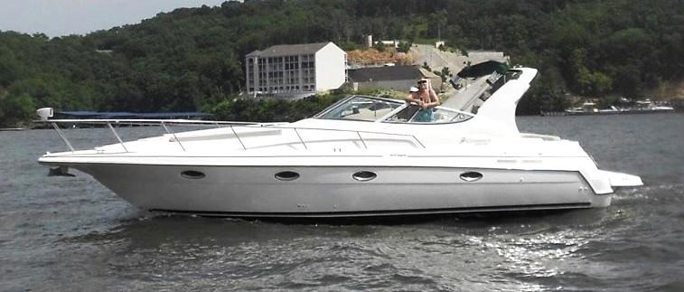 Cruisers Yachts 3375 Esprit 1999 Cruisers Yachts 3375 Esprit on water, with scenic background and modern design.