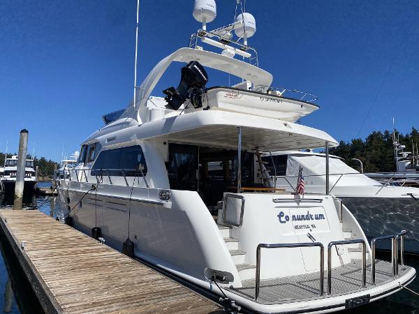 Regency Yachts 670 Pilothouse 2007 Regency Yachts 670 Pilothouse docked at a marina on a sunny day.