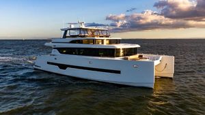 ILIAD 70 Luxury ILIAD 70 yacht cruising at sunset, 2019 model, on open sea.