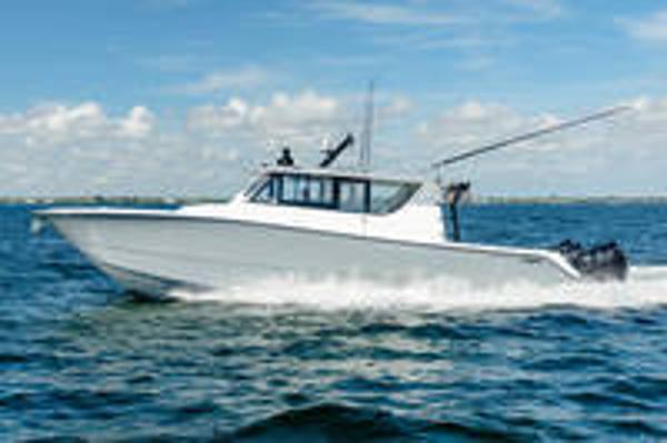 Invincible 46' Catamaran Pilothouse 2023 Invincible 46' Catamaran Pilothouse cruising on open water.