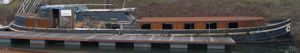 De Groningen (NL) Peniche Old De Groningen Peniche barge from 1955 docked by the riverside.