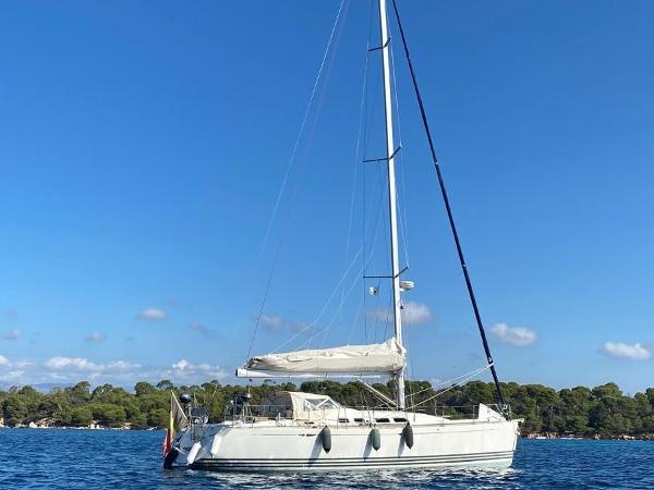 X-Yachts X-43 2007 X-Yachts X-43 sailboat on calm water under clear blue sky.