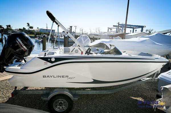 Bayliner M17 2024 Bayliner M17 boat on trailer at marina.