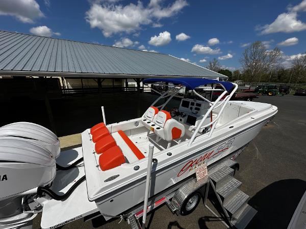 Ocean Hawk 33 Center Console 2024 Ocean Hawk 33 Center Console boat with orange seating, parked on a trailer.