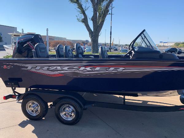Tracker Targa V-19 WT 2023 Tracker Targa V-19 WT boat on trailer, side view.