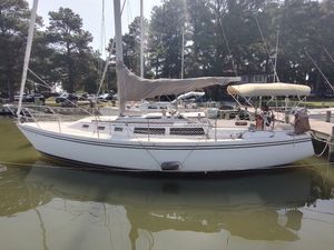 Catalina C-34 1986 Catalina C-34 sailboat docked in a serene marina setting.