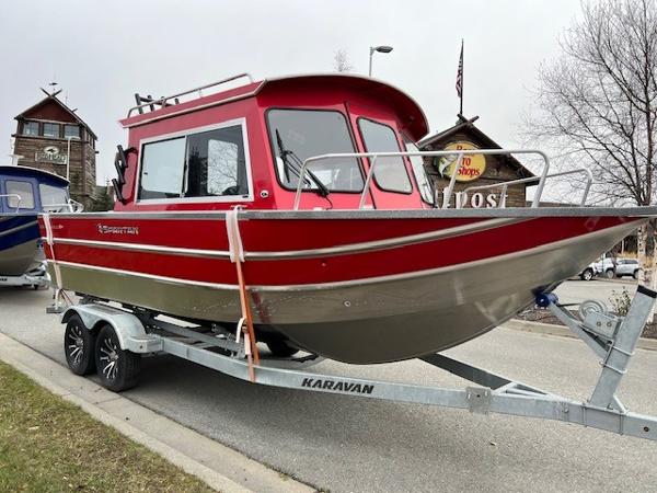 Spartan 220 Maximus 2024 Spartan 220 Maximus boat in red on a Karavan trailer.