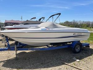Larson 180 Bowrider SEI 2006 Larson 180 Bowrider SEI on trailer, covered, parked outdoors.