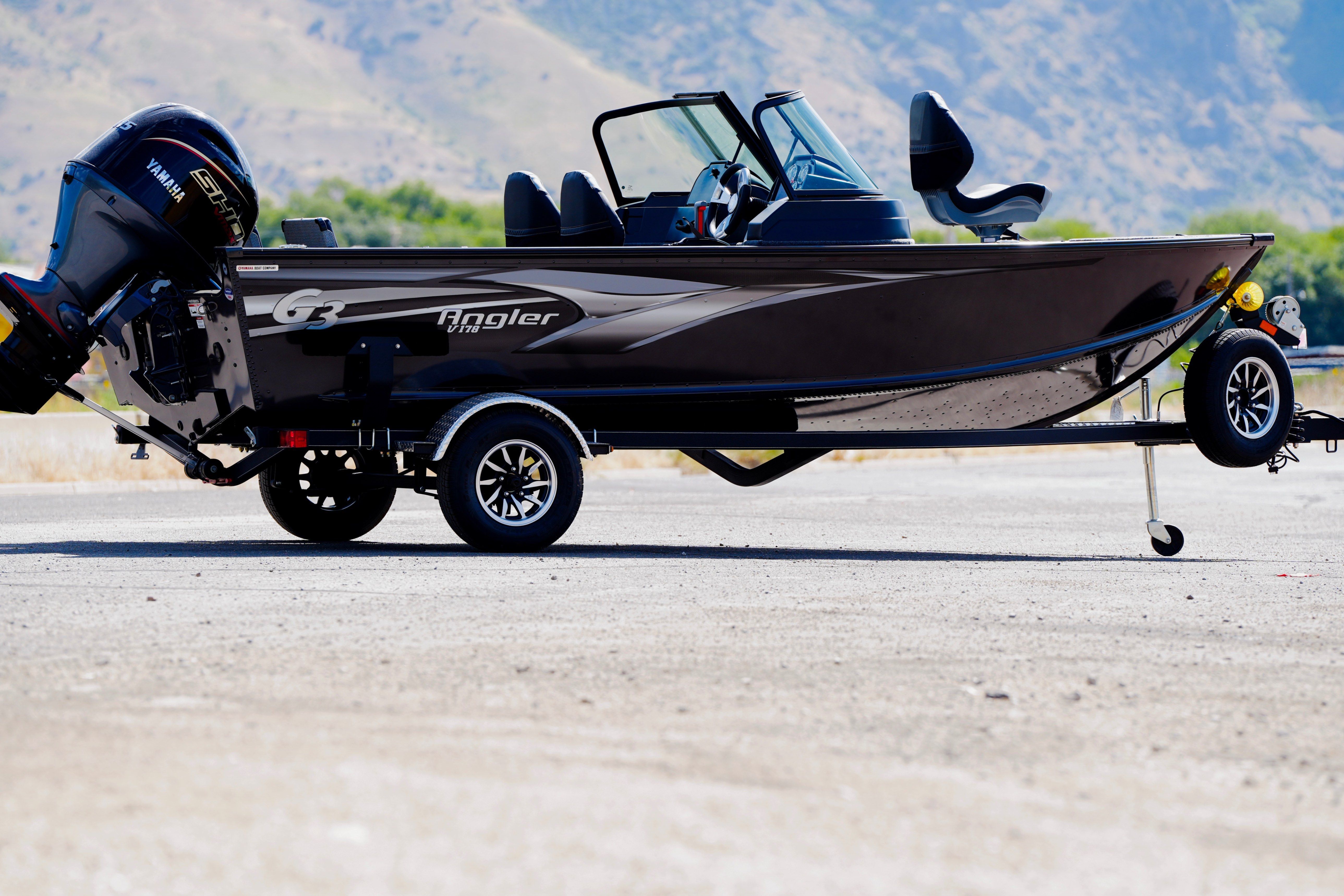 G3 G3 Av178F 2025 G3 Av178F boat on trailer with Yamaha motor, parked outdoors.